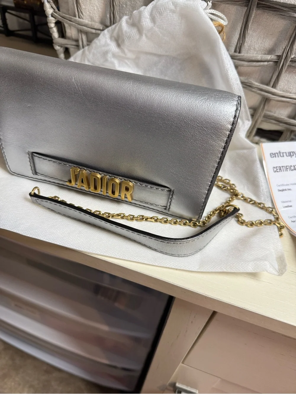 Dior J'Adior wallet metallic leather and signature gold-tone hardware.